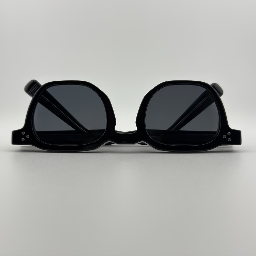 Velra Alton Obsidian – lunettes de soleil, vue du dessus : silhouette épaisse en acétate noir brillant pour une touche d’intensité et de modernité.
