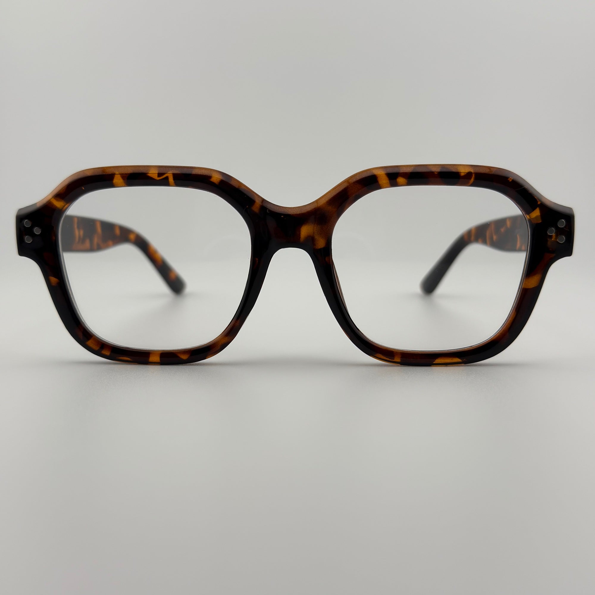 Velra Lyra lunettes de vue écaille, vue de face – silhouette arrondie et monture épaisse pour un look rétro et structuré.
