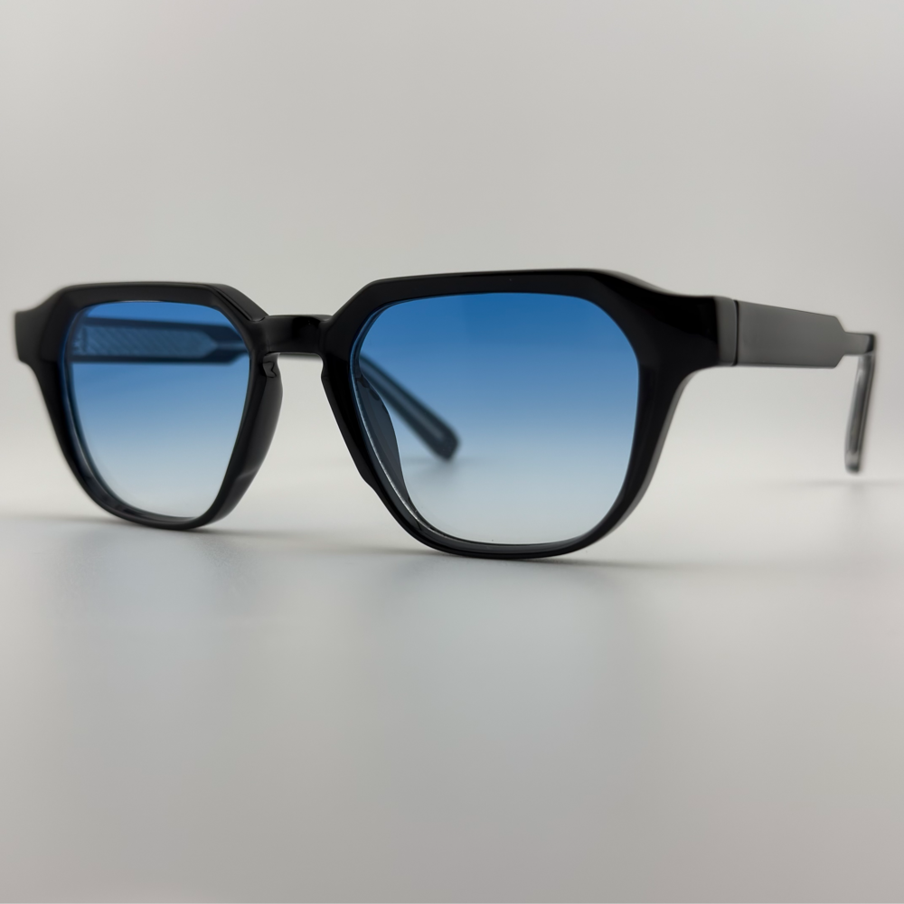 Velra PRISMA ICE – lunettes de soleil, vue 3/4 latérale : monture noir et bleu miroir avec effet miroir bleuté.
