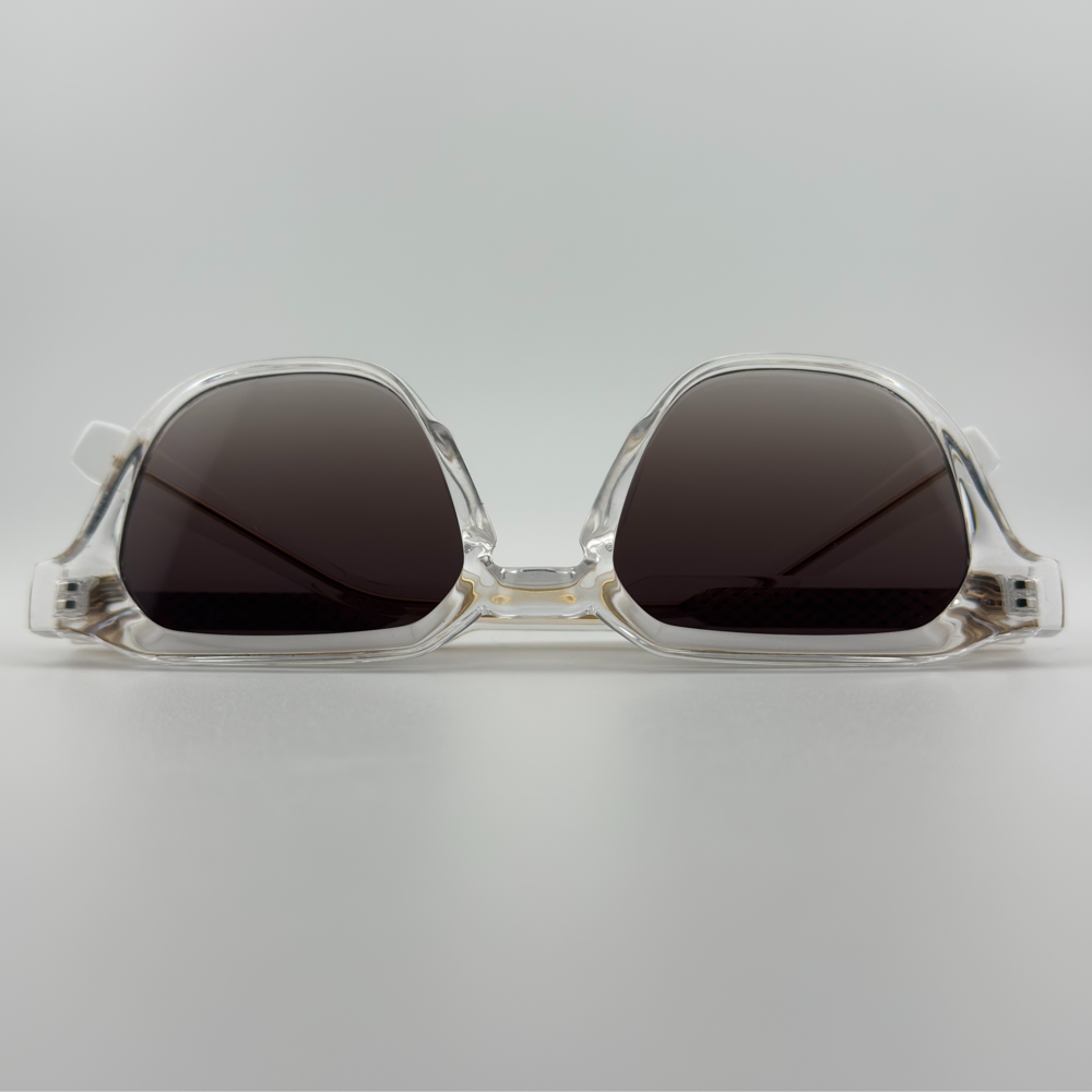 Velra PRISMA SMOKE – lunettes de soleil, vue du dessus : monture transparente et verres fumés marron dégradé.
