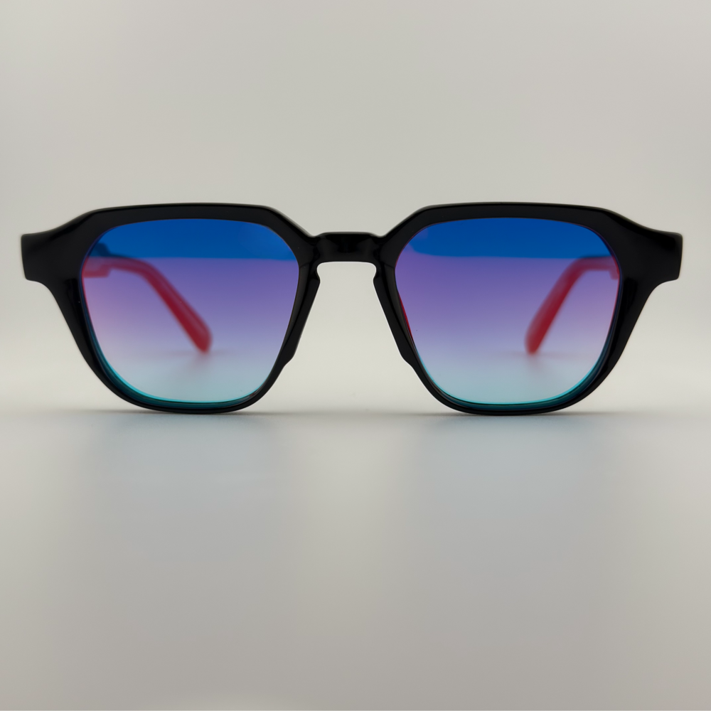 Velra PRISMA SUNSET – lunettes de soleil, vue de face : monture noir brillant et verres dégradés rose-bleu avec reflets colorés style coucher de soleil.
