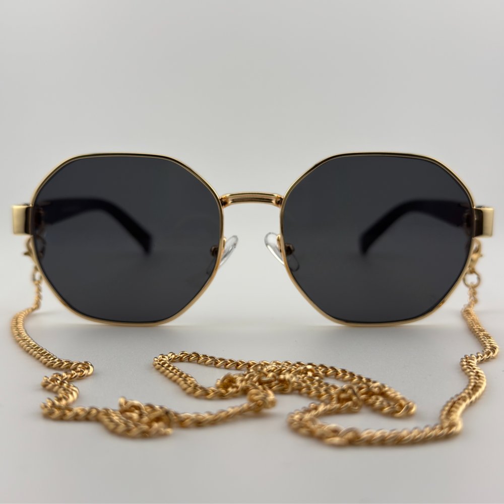 Velra Veya lunettes de soleil rondes noir et or, vue de face – chaîne dorée amovible et silhouette rétro chic.
